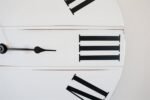 Simple White Lightly Distressed Large Wall Clock with Black Roman Numerals (in stock)