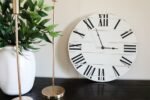 Simple White Lightly Distressed Large Wall Clock with Black Roman Numerals (in stock)